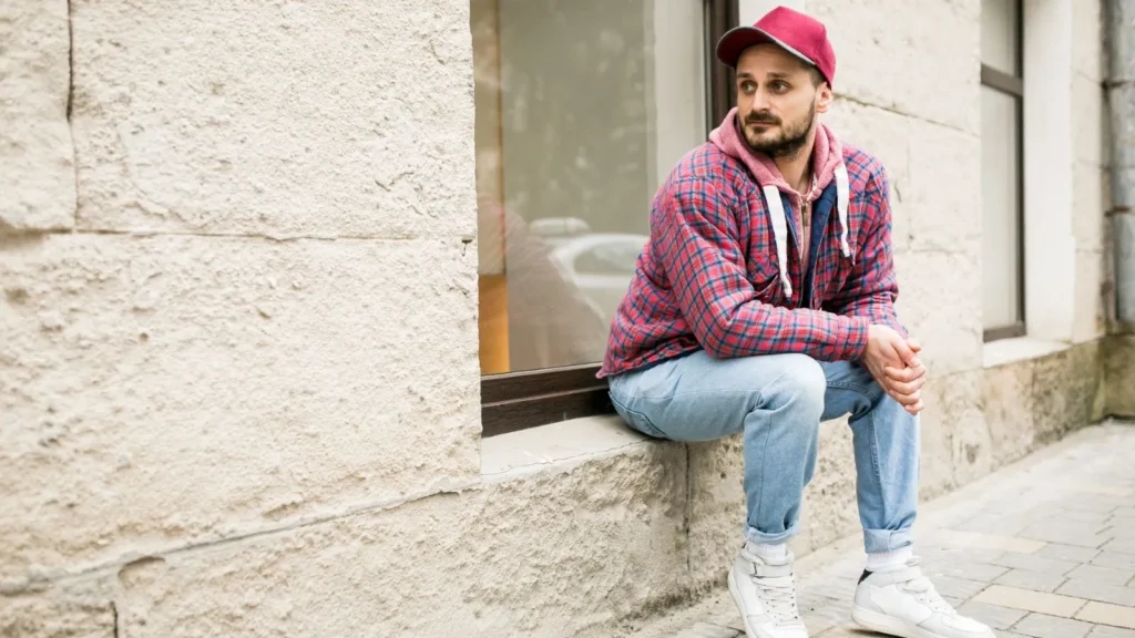 Holding Authentic Jordan Outfits for Men